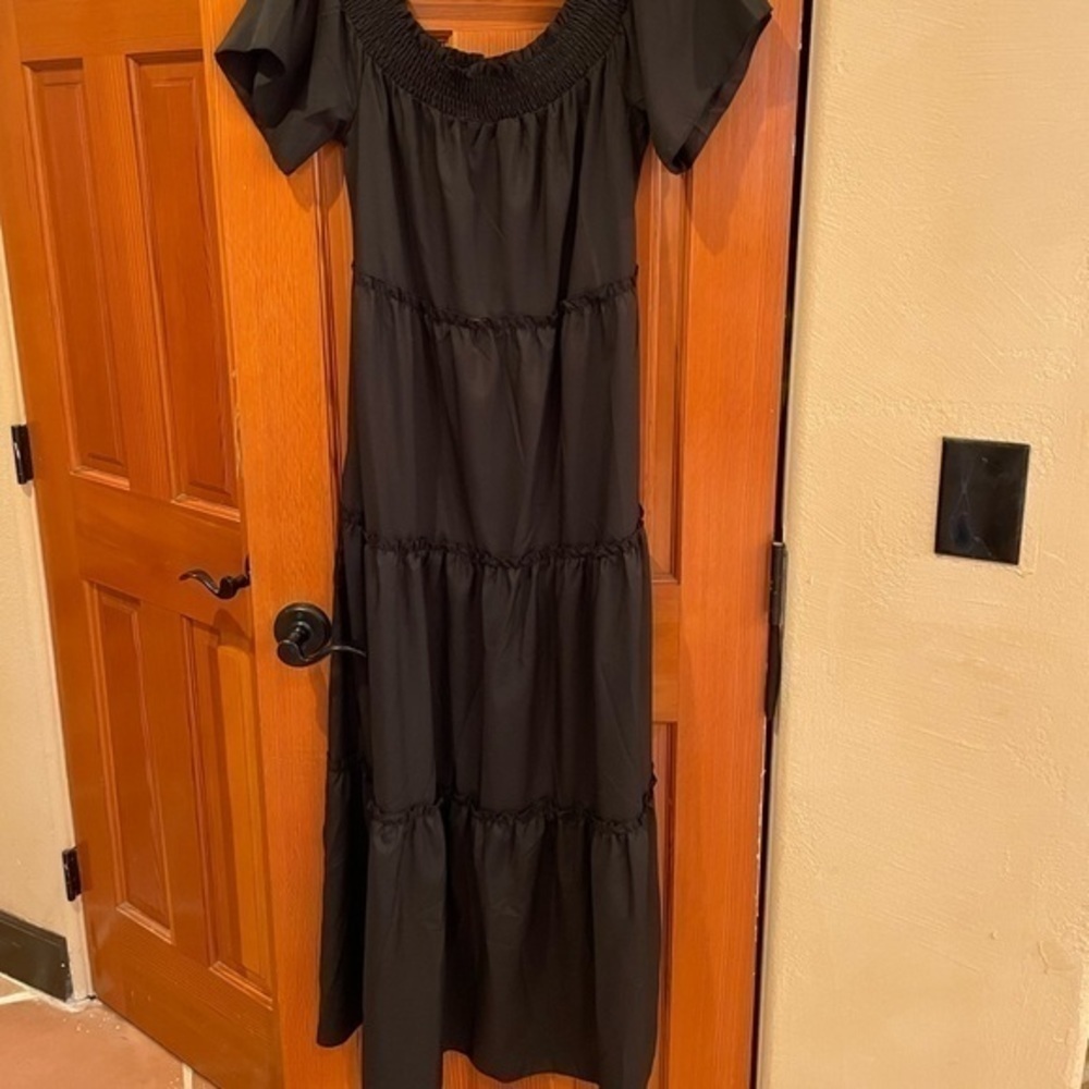 Black off the shoulder ruffle maxi dress